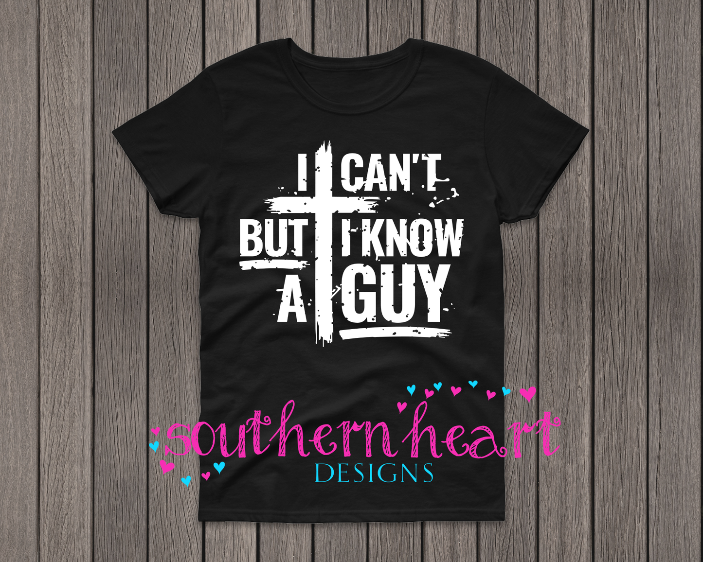 Black men’s t-shirt with white screen-printed text that reads “I can’t but I know a guy” alongside a cross, made of Gildan heavy cotton 50/50 fabric.
