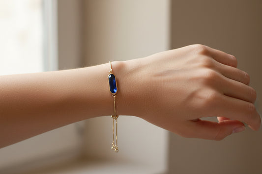 Gold plated adjustable bracelet with sapphire blue glass centerpiece, Skye bracelet minimal jewelry