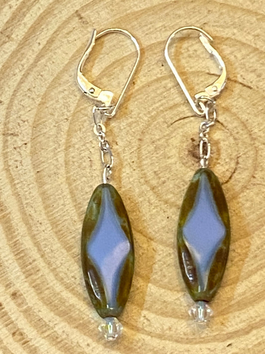 Silver-toned earrings with table cut blue diamond-shaped beads and interchangeable lever backs, approx. 2¾ inches long.