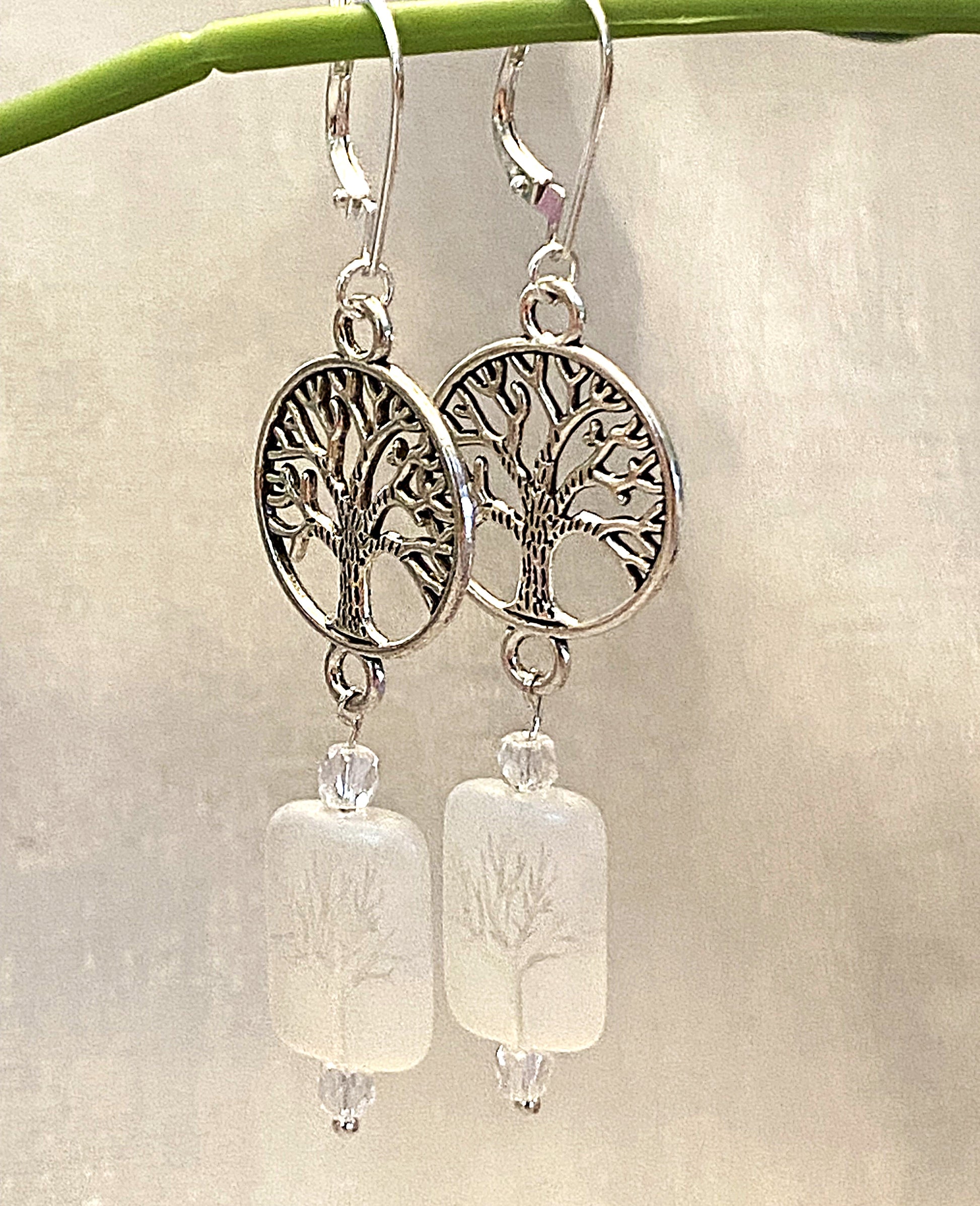 Silver-toned Tree of Life earrings with interchangeable lever backs, approximately 2¾ inches long.