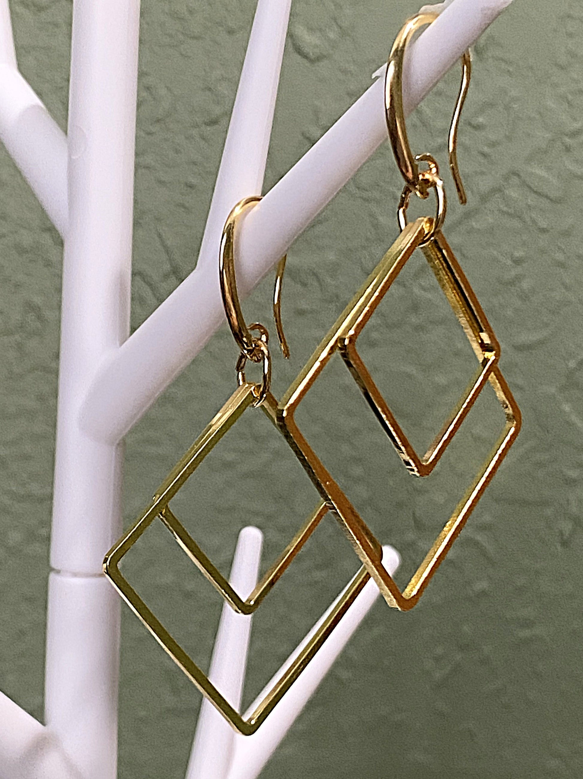 Gold-toned double square earrings with ear wire style, approximately 2¼ inches long.