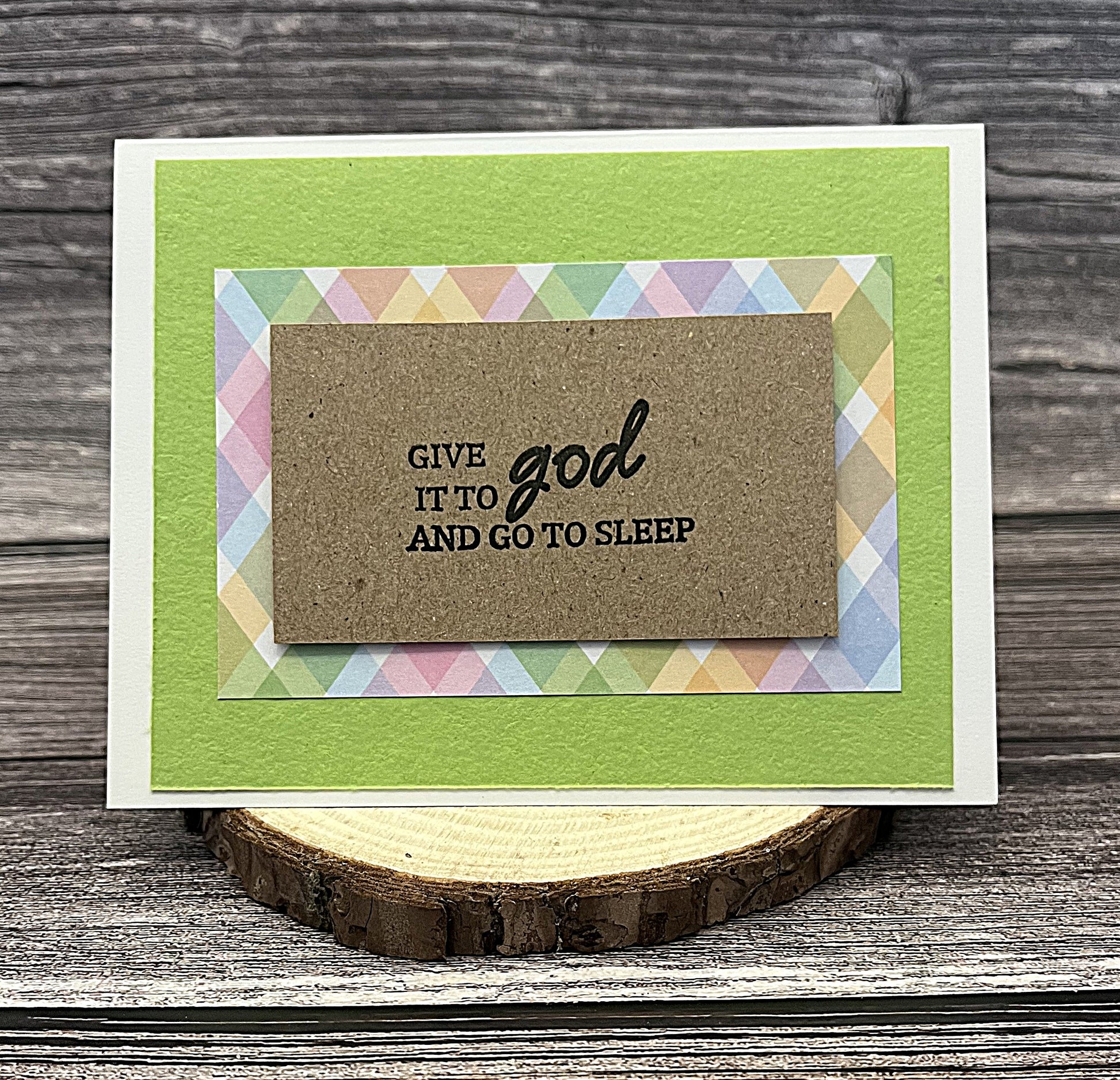 Christian spring notecard with white base, green and pastel plaid decorative paper, and message Give It to God and Go to Sleep