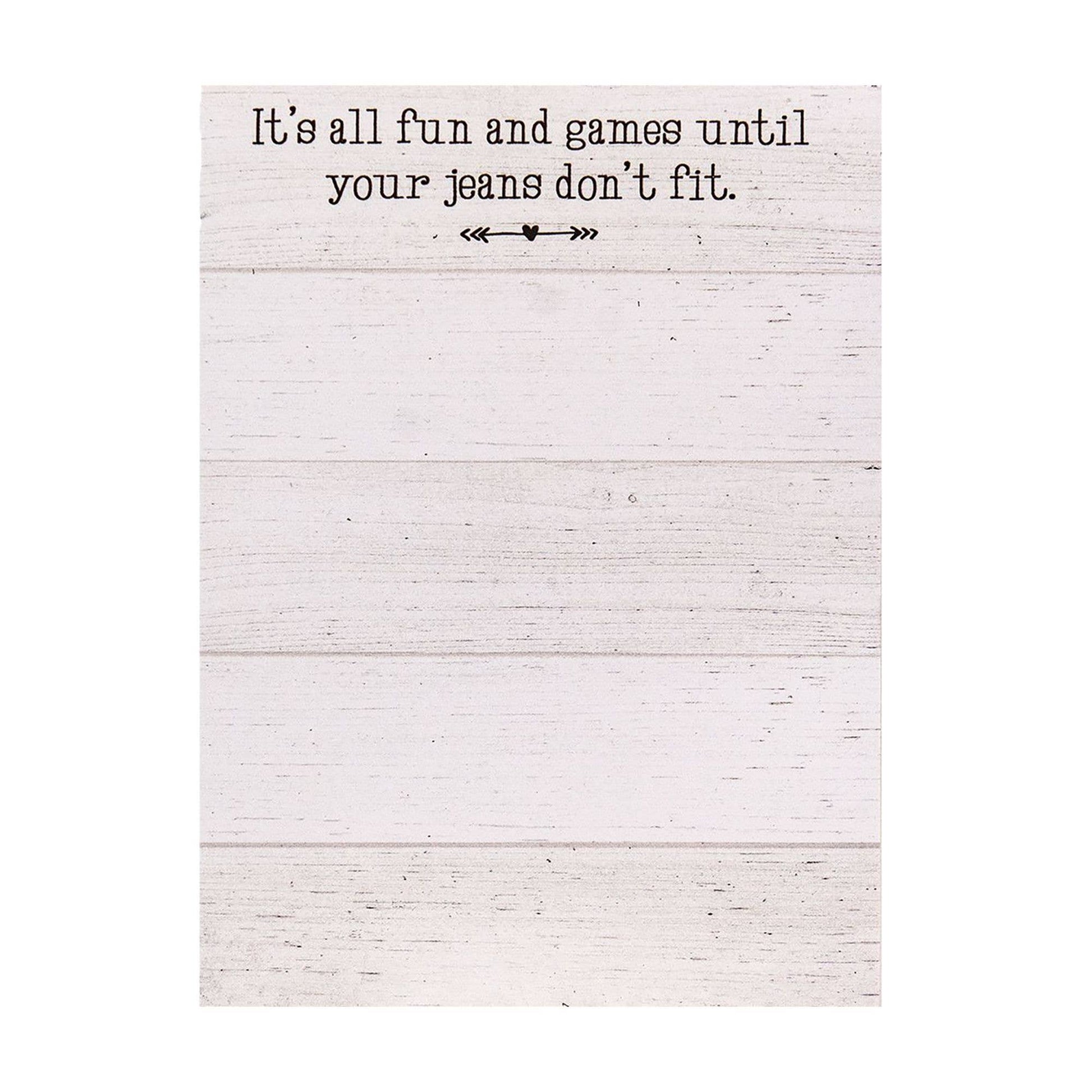 Mini notepad with 50 sheets (5.5" x 4") featuring a shiplap design and the phrase “It’s all fun and games until your jeans don’t fit,” with optional magnet.