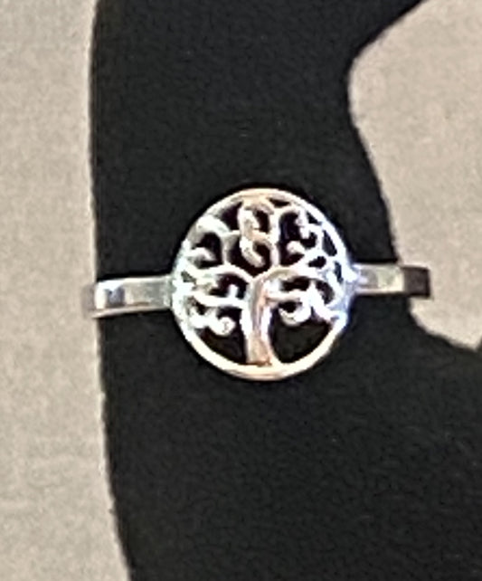 Sterling silver Tree of Life ring with intricate detailing and polished finish.