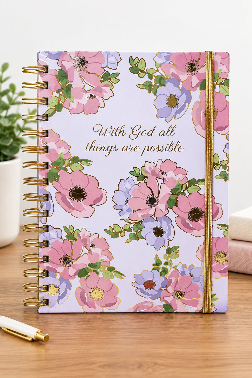 Purple prayer journal with pink and purple flowers and the words “With God All Things Are Possible” on the cover, including a prayer memo pad and pen.