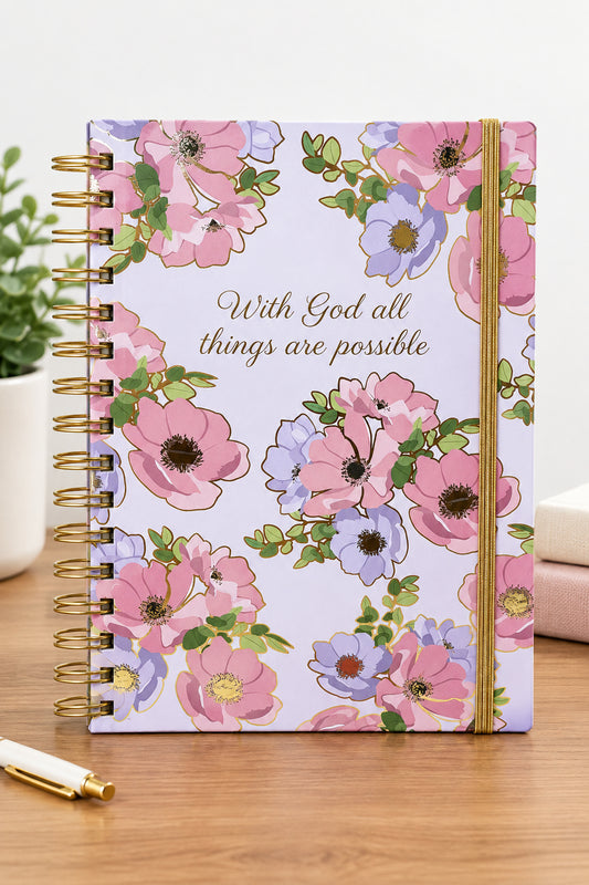 Purple prayer journal with pink and purple flowers and the words “With God All Things Are Possible” on the cover, including a prayer memo pad and pen.